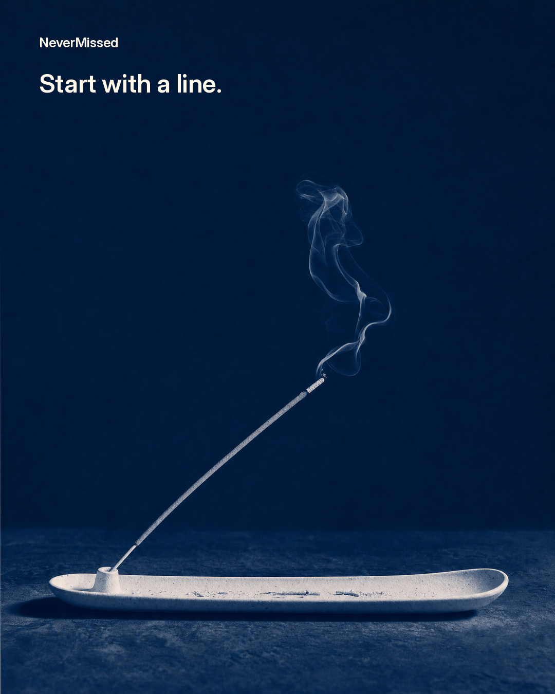NeverMissed incense concept: a single line of smoke against a deep blue background